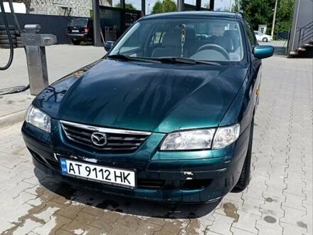 Зеленый Мазда 626, объемом двигателя 2 л и пробегом 235 тыс. км за 3300 $, фото 1 на Automoto.ua