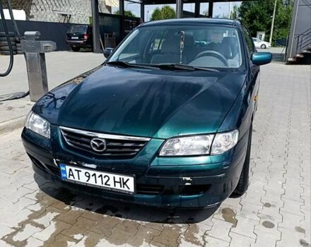 Зеленый Мазда 626, объемом двигателя 2 л и пробегом 235 тыс. км за 3300 $, фото 1 на Automoto.ua