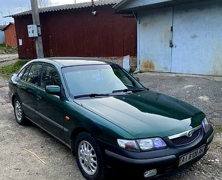 Зеленый Мазда 626, объемом двигателя 2 л и пробегом 300 тыс. км за 1130 $, фото 1 на Automoto.ua