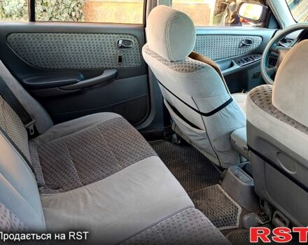 Зеленый Мазда 626, объемом двигателя 2 л и пробегом 480 тыс. км за 3500 $, фото 1 на Automoto.ua