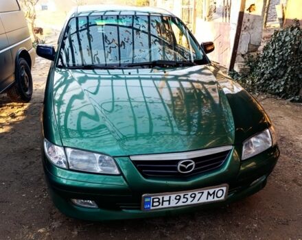 Зеленый Мазда 626, объемом двигателя 2 л и пробегом 480 тыс. км за 3500 $, фото 1 на Automoto.ua