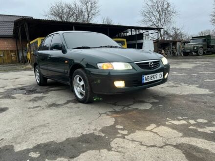 Зеленый Мазда 626, объемом двигателя 2 л и пробегом 286 тыс. км за 3500 $, фото 1 на Automoto.ua