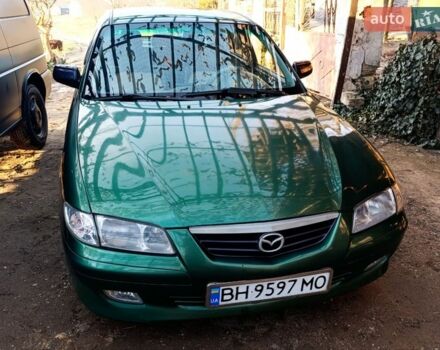 Зеленый Мазда 626, объемом двигателя 2 л и пробегом 480 тыс. км за 3302 $, фото 1 на Automoto.ua