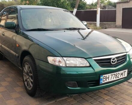 Зелений Мазда 626, об'ємом двигуна 2 л та пробігом 229 тис. км за 3599 $, фото 1 на Automoto.ua