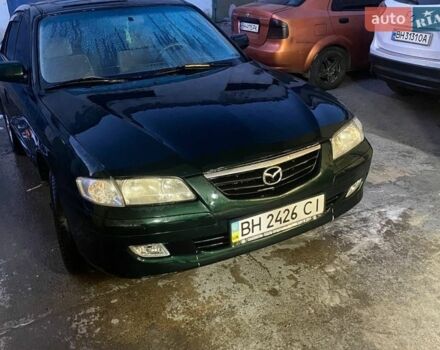 Зеленый Мазда 626, объемом двигателя 2 л и пробегом 245 тыс. км за 2300 $, фото 1 на Automoto.ua