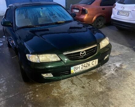 Зеленый Мазда 626, объемом двигателя 2 л и пробегом 245 тыс. км за 2300 $, фото 1 на Automoto.ua