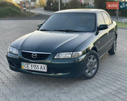 Зеленый Мазда 626, объемом двигателя 2 л и пробегом 284 тыс. км за 2450 $, фото 1 на Automoto.ua