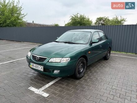 Зеленый Мазда 626, объемом двигателя 2 л и пробегом 312 тыс. км за 2150 $, фото 1 на Automoto.ua