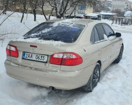 Зеленый Мазда 626, объемом двигателя 2 л и пробегом 272 тыс. км за 2100 $, фото 1 на Automoto.ua