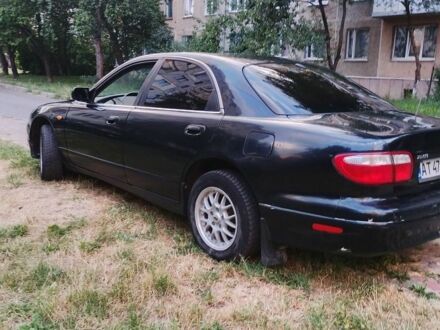 Черный Мазда 929, объемом двигателя 2.3 л и пробегом 290 тыс. км за 2410 $, фото 1 на Automoto.ua