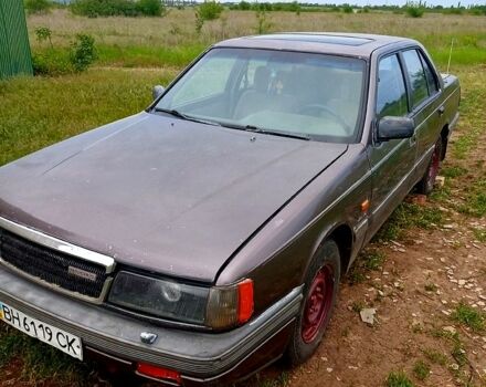 Коричневий Мазда 929, об'ємом двигуна 2.2 л та пробігом 112 тис. км за 800 $, фото 1 на Automoto.ua