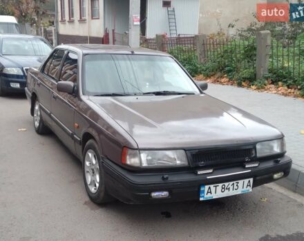 Коричневий Мазда 929, об'ємом двигуна 2.2 л та пробігом 438 тис. км за 1114 $, фото 1 на Automoto.ua