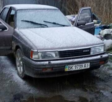 Коричневый Мазда 929, объемом двигателя 3 л и пробегом 450 тыс. км за 2200 $, фото 1 на Automoto.ua