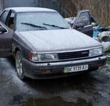 Коричневый Мазда 929, объемом двигателя 3 л и пробегом 450 тыс. км за 2200 $, фото 1 на Automoto.ua