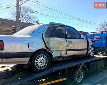 Серый Мазда 929, объемом двигателя 2.2 л и пробегом 234 тыс. км за 900 $, фото 1 на Automoto.ua