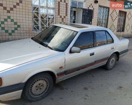 Сірий Мазда 929, об'ємом двигуна 2.2 л та пробігом 390 тис. км за 1000 $, фото 1 на Automoto.ua