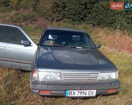 Серый Мазда 929, объемом двигателя 2.2 л и пробегом 597 тыс. км за 1000 $, фото 1 на Automoto.ua