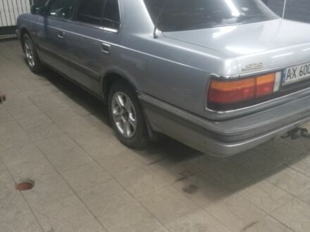 Мазда 929 1988 в Купянске на Automoto.ua Серый Мазда 929, объемом двигателя 2 л и пробегом 292 тыс. км за 1600 $, фото 1 на Automoto.ua