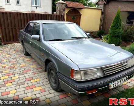 Серый Мазда 929, объемом двигателя 2.2 л и пробегом 383 тыс. км за 799 $, фото 1 на Automoto.ua