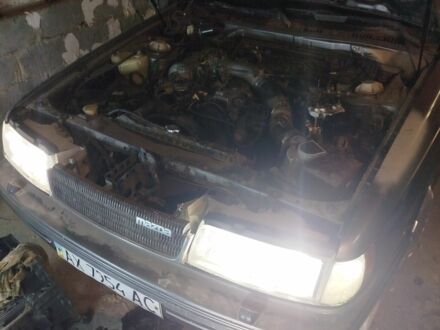 Сірий Мазда 929, об'ємом двигуна 2.2 л та пробігом 1 тис. км за 1038 $, фото 1 на Automoto.ua