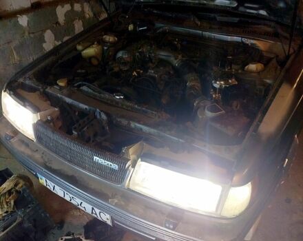 Серый Мазда 929, объемом двигателя 2.2 л и пробегом 256 тыс. км за 1400 $, фото 1 на Automoto.ua