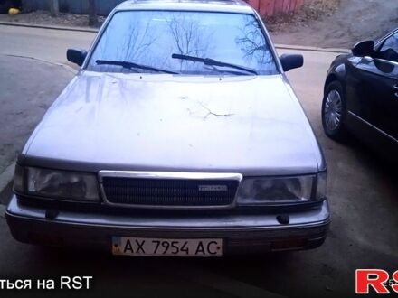 Сірий Мазда 929, об'ємом двигуна 2.2 л та пробігом 10 тис. км за 1500 $, фото 1 на Automoto.ua