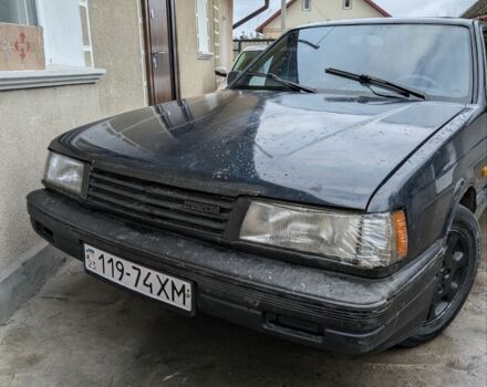 Синий Мазда 929, объемом двигателя 2.2 л и пробегом 413 тыс. км за 700 $, фото 1 на Automoto.ua