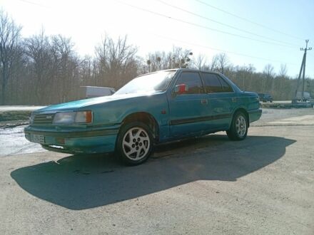 Зеленый Мазда 929, объемом двигателя 2.2 л и пробегом 123 тыс. км за 800 $, фото 1 на Automoto.ua