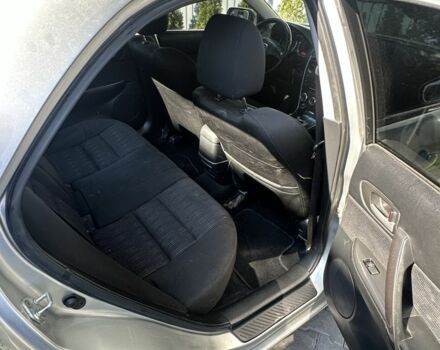 Серый Мазда Атенза, объемом двигателя 2 л и пробегом 235 тыс. км за 2500 $, фото 3 на Automoto.ua