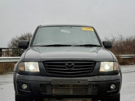 Черный Мазда Б серия, объемом двигателя 2.5 л и пробегом 200 тыс. км за 4200 $, фото 1 на Automoto.ua