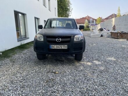 Белый Мазда БТ-50, объемом двигателя 2.5 л и пробегом 332 тыс. км за 8650 $, фото 1 на Automoto.ua