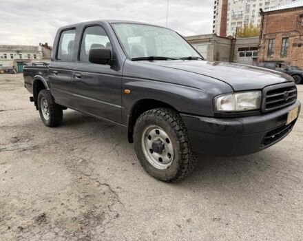 Серый Мазда БТ-50, объемом двигателя 2.5 л и пробегом 233 тыс. км за 3800 $, фото 3 на Automoto.ua