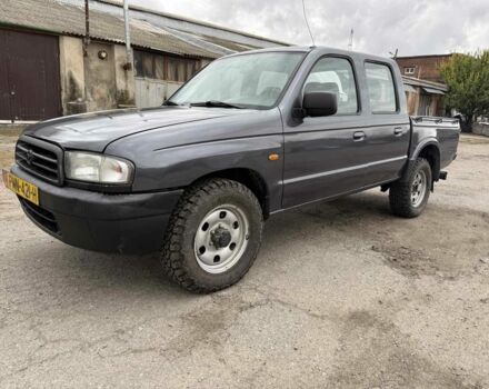 Серый Мазда БТ-50, объемом двигателя 2.5 л и пробегом 233 тыс. км за 3800 $, фото 1 на Automoto.ua