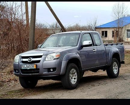 Серый Мазда БТ-50, объемом двигателя 2.5 л и пробегом 356 тыс. км за 8000 $, фото 1 на Automoto.ua