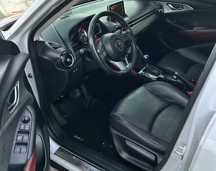 Белый Мазда СХ-3, объемом двигателя 2 л и пробегом 124 тыс. км за 13200 $, фото 10 на Automoto.ua