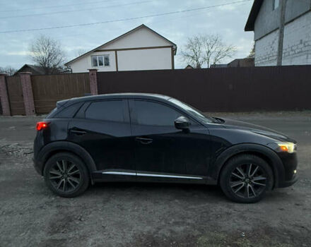 Чорний Мазда СХ-3, об'ємом двигуна 2 л та пробігом 149 тис. км за 15000 $, фото 4 на Automoto.ua