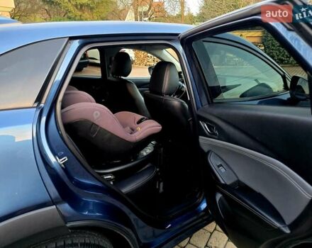 Синий Мазда СХ-3, объемом двигателя 1.8 л и пробегом 86 тыс. км за 21999 $, фото 56 на Automoto.ua