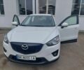 Білий Мазда СХ-5, об'ємом двигуна 2.2 л та пробігом 173 тис. км за 13000 $, фото 1 на Automoto.ua