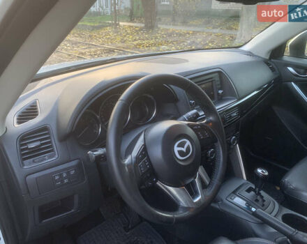 Белый Мазда СХ-5, объемом двигателя 2 л и пробегом 209 тыс. км за 12500 $, фото 9 на Automoto.ua