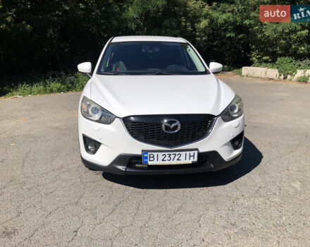Білий Мазда СХ-5, об'ємом двигуна 2 л та пробігом 143 тис. км за 13900 $, фото 2 на Automoto.ua