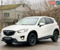 Белый Мазда СХ-5, объемом двигателя 2 л и пробегом 209 тыс. км за 12799 $, фото 1 на Automoto.ua