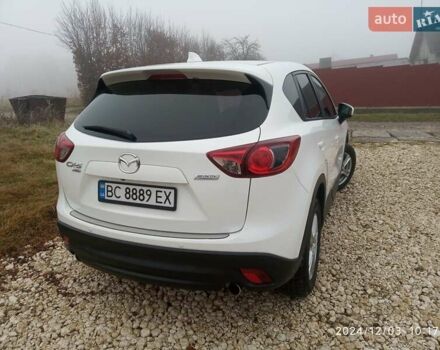 Белый Мазда СХ-5, объемом двигателя 2.19 л и пробегом 225 тыс. км за 14500 $, фото 13 на Automoto.ua