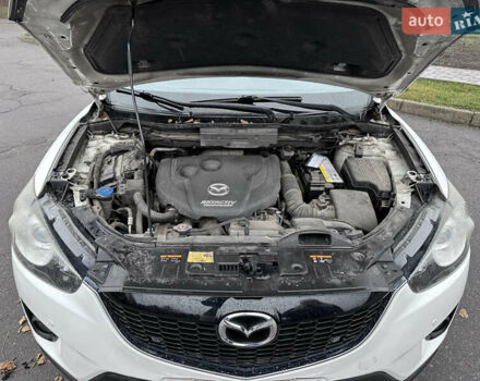 Белый Мазда СХ-5, объемом двигателя 2.19 л и пробегом 248 тыс. км за 13500 $, фото 16 на Automoto.ua