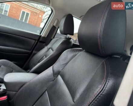 Білий Мазда СХ-5, об'ємом двигуна 2 л та пробігом 136 тис. км за 12640 $, фото 22 на Automoto.ua