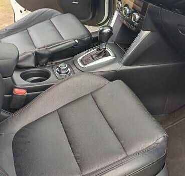 Білий Мазда СХ-5, об'ємом двигуна 2.19 л та пробігом 173 тис. км за 14000 $, фото 5 на Automoto.ua