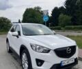 Белый Мазда СХ-5, объемом двигателя 2.2 л и пробегом 250 тыс. км за 12000 $, фото 1 на Automoto.ua