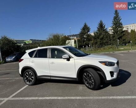 Белый Мазда СХ-5, объемом двигателя 2.5 л и пробегом 92 тыс. км за 15950 $, фото 1 на Automoto.ua