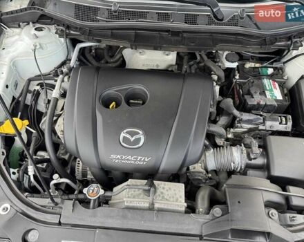 Білий Мазда СХ-5, об'ємом двигуна 2.49 л та пробігом 77 тис. км за 15500 $, фото 17 на Automoto.ua