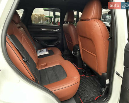 Белый Мазда СХ-5, объемом двигателя 2.49 л и пробегом 140 тыс. км за 21900 $, фото 18 на Automoto.ua