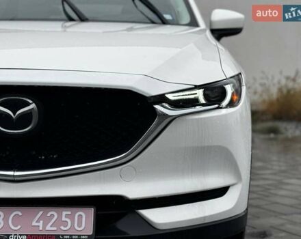 Белый Мазда СХ-5, объемом двигателя 2.49 л и пробегом 105 тыс. км за 17990 $, фото 1 на Automoto.ua